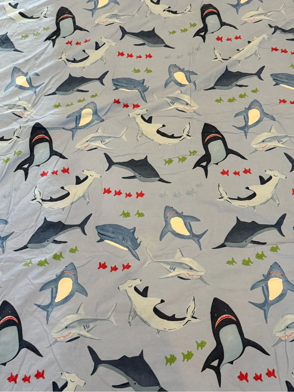 Pottery Barn Kids Shark Bite duvet cover featuring blue sharks